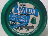a close up of a container of valda