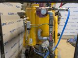 a yellow machine with a blue hose attached to it