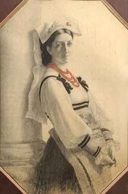 portrait of a woman in a sailor ' s outfit with a red ribbon around her neck