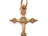 a cross with a flower on it is shown on a white background
