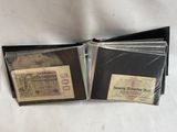 two old german bank notes are sitting on a white cloth