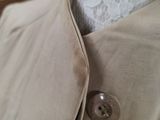 an image of a close up of a jacket on a mannequin mannequin