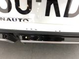 a close up of a license plate on the back of a car