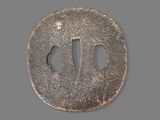 a very old coin with a design on it