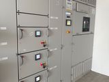 a bunch of electrical equipment that are on the wall