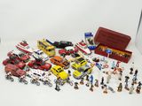 a lot of toys that are on a white surface