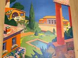 une affiche accrochée au mur d'une maison avec une vue sur l'océan