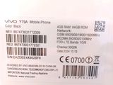 the back of a white box with a barcode on it