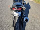 a motorcycle that is parked on the side of the road