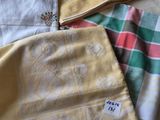 several different types of cloths laid out on a table