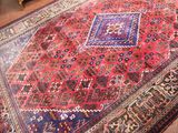 a rug on the floor in a living room