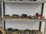 a lot of tools on the shelves in the garage