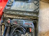 a tool box that has tools in it on the floor
