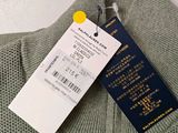 a tag on a sweater that says it ' s not for sale