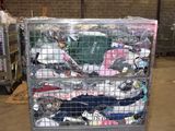 a large metal cart with a lot of clothes on it