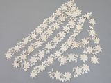 a close up of a piece of lace with flowers on it