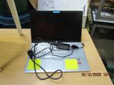 a laptop computer that is sitting on a desk
