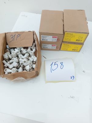 a box of nuts and a box of screws on a table