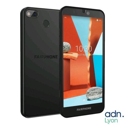 a black smartphone with a picture of a rock on the screen