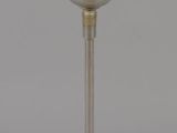 an image of a table lamp with a white glass shade