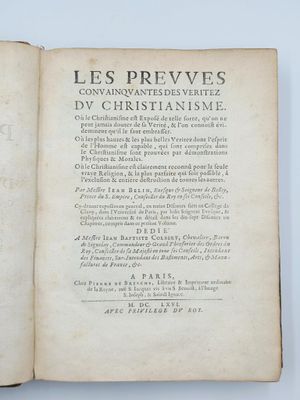 un livre ouvert sur lequel figure la photo d'un homme