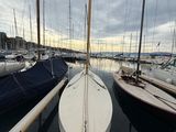 many sailboats that are docked in the water