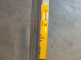 a pencil that is sitting on top of a piece of paper