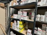 many boxes on the shelves in the warehouse