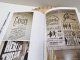 an open book with a picture of a bunch of signs on it