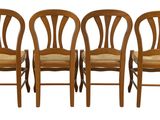six chairs are lined up in a row on a white background