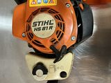 an image of a chainsaw on a metal surface