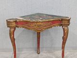 a small table with a marble top on it