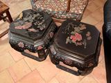 several pieces of furniture sitting on a tiled floor in a living room