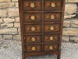 a picture of a wooden wall mounted with many drawers