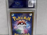 a close up of a pokemon card in a clear plastic case