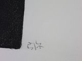 someone is writing on a piece of paper with a pencil