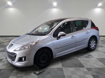 a picture of a silver car parked in a garage