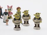 toy figurines of a group of people dressed in different costumes