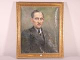 painting of a man in a suit and tie in a gold frame