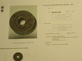 une photo d'une page sur laquelle figure l'image d'une pièce de monnaie