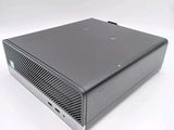 an image of a small computer on a white surface