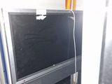 a television that is sitting on top of a cabinet
