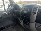a car that is sitting in a lot with a steering wheel