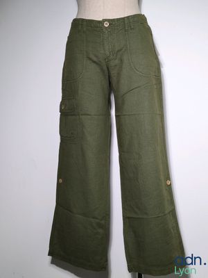 a close up of a mannequin mannequin wearing a pair of green pants