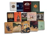 a lot of books that are sitting on a table