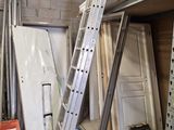 a ladder that is leaning against a wall in a room