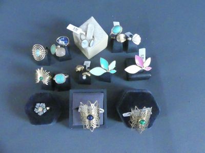 a lot of rings that are sitting on a table