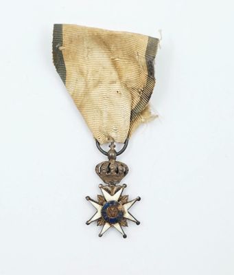 l'image d'une médaille portant une étoile