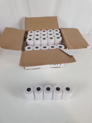 several rolls of toilet paper in a box on a table