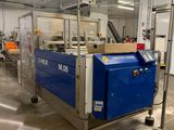 a large machine that is moving through a factory